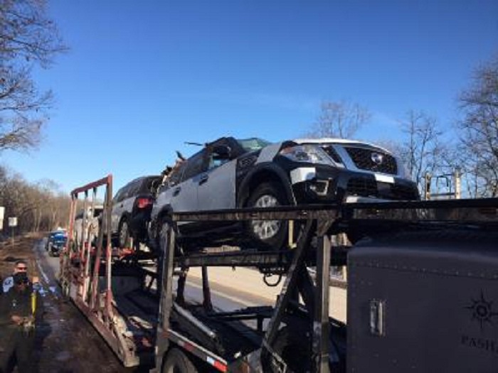 Serbia arrests three after 77 migrants found hidden in vehicles 
